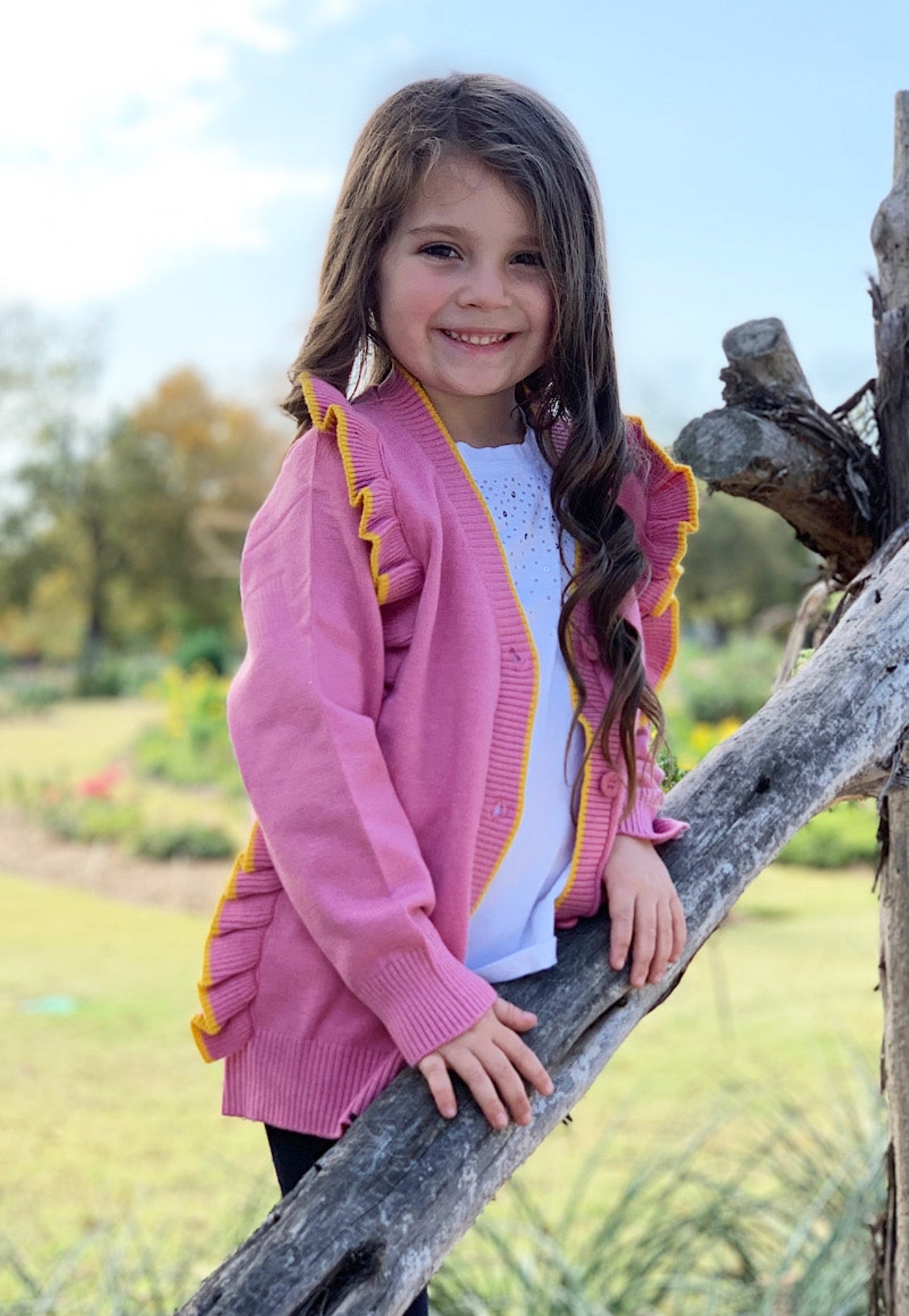 Pink V-Neck Sweater with Yellow Ruffle Trim